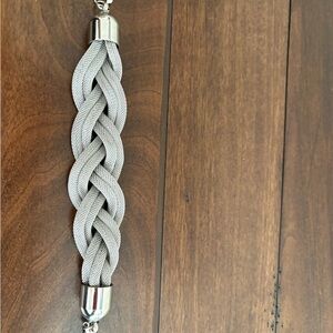 Silver Braided Bracelet- never worn a little art of the tag still on.